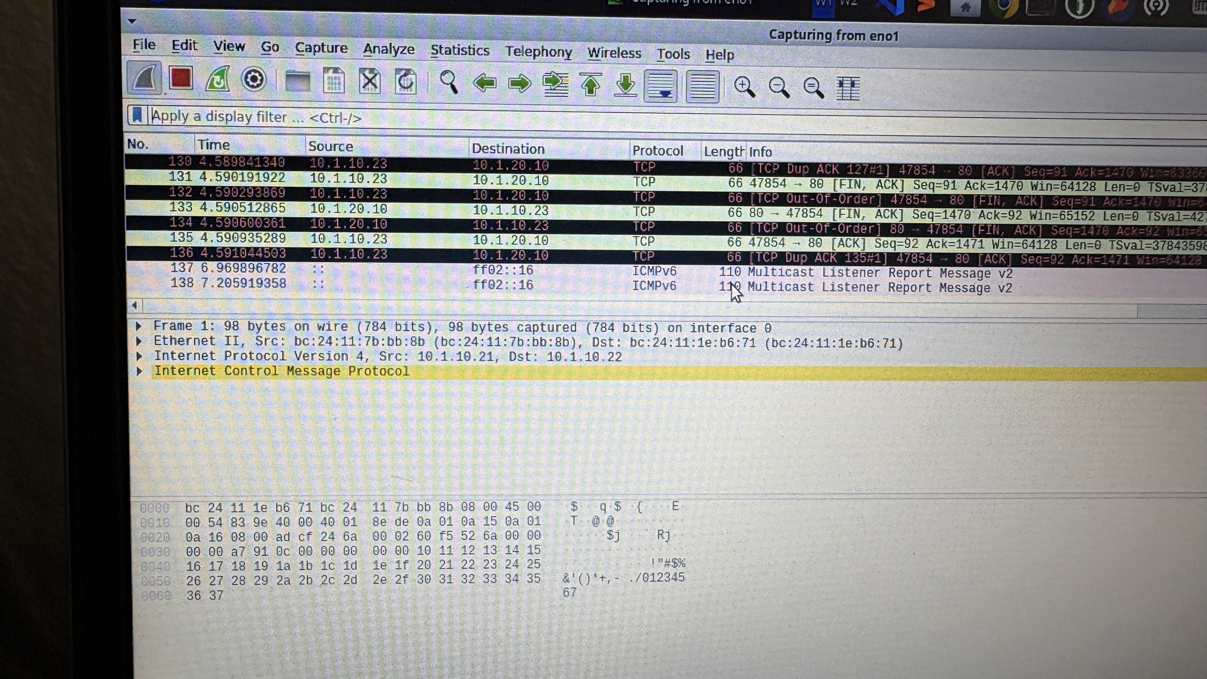 Wireshark on the utility laptop capturing mirrored range traffic.
