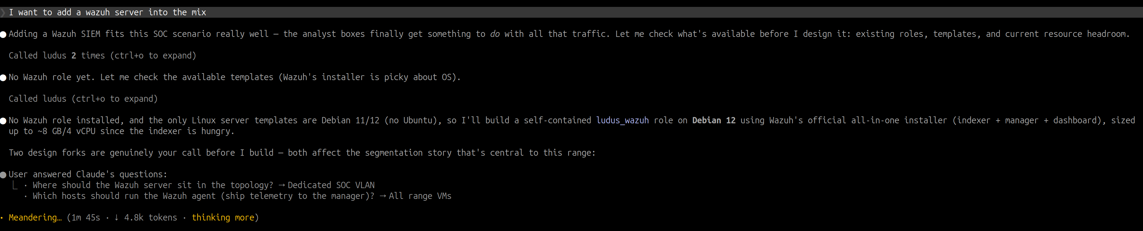 Claude Code session asking where the Wazuh server should sit (dedicated SOC VLAN) and which hosts should run the agent (all range VMs).